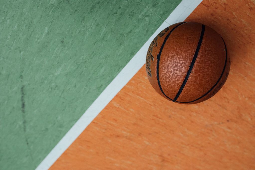 basketball on a floor with white line